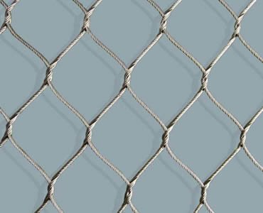 A piece of stainless steel knotted rope mesh.
