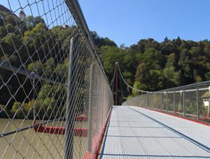 Both sides of a suspension bridge is mounted with stainless steel balustrade for protecting passing vehicles and pedestrians.